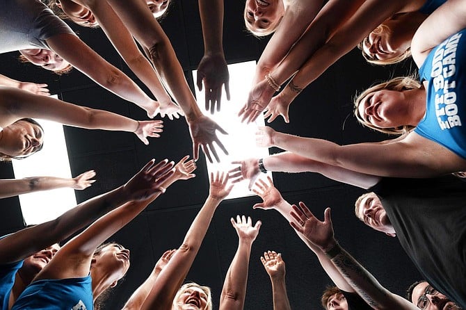 A group of people during a huddle