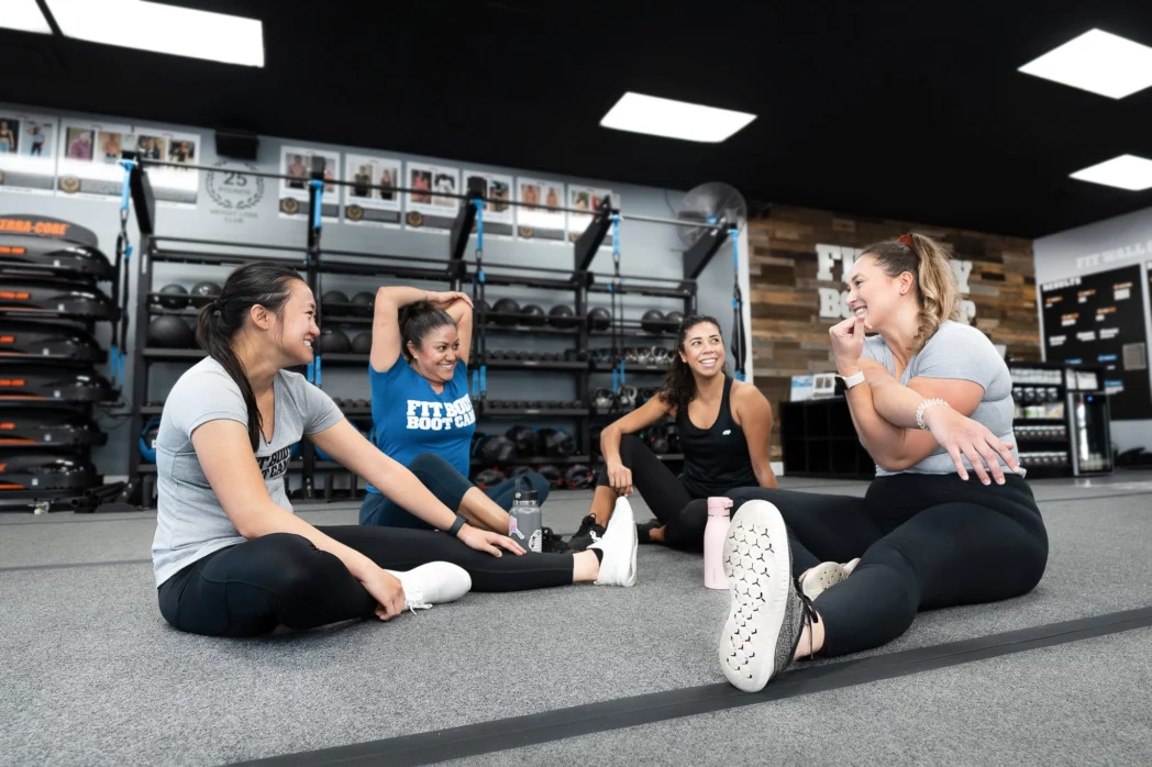 Women stretching at Fit Body Boot Camp